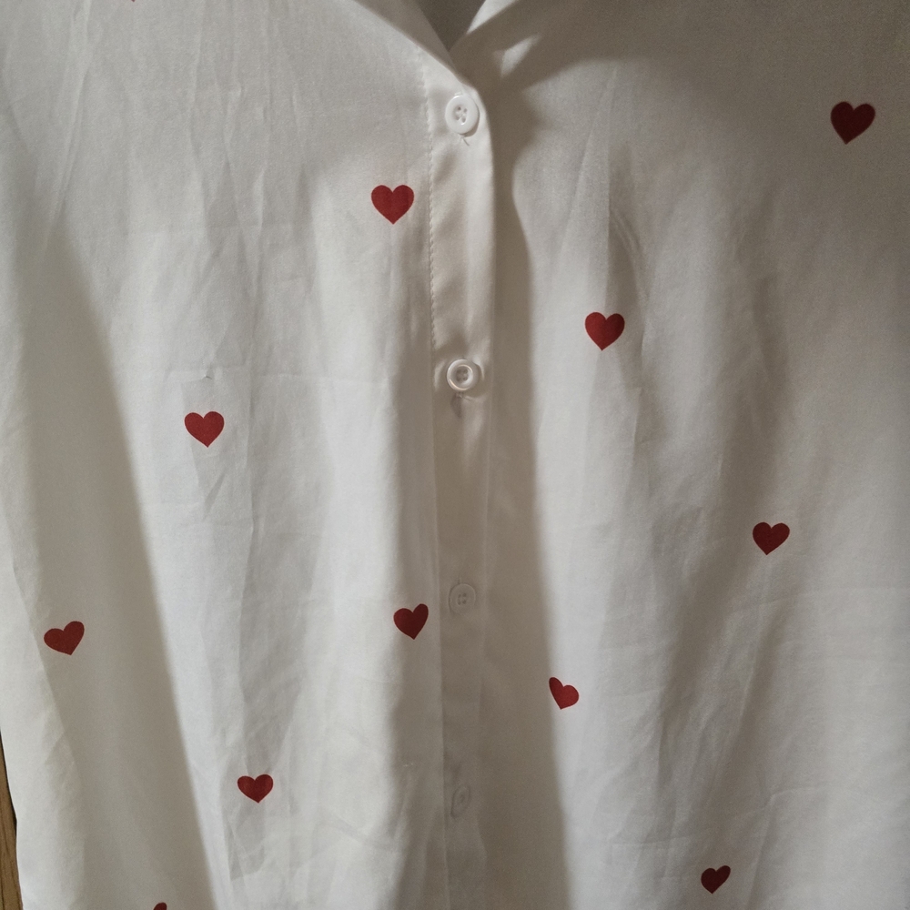 White Shirt with Red Heart Pattern